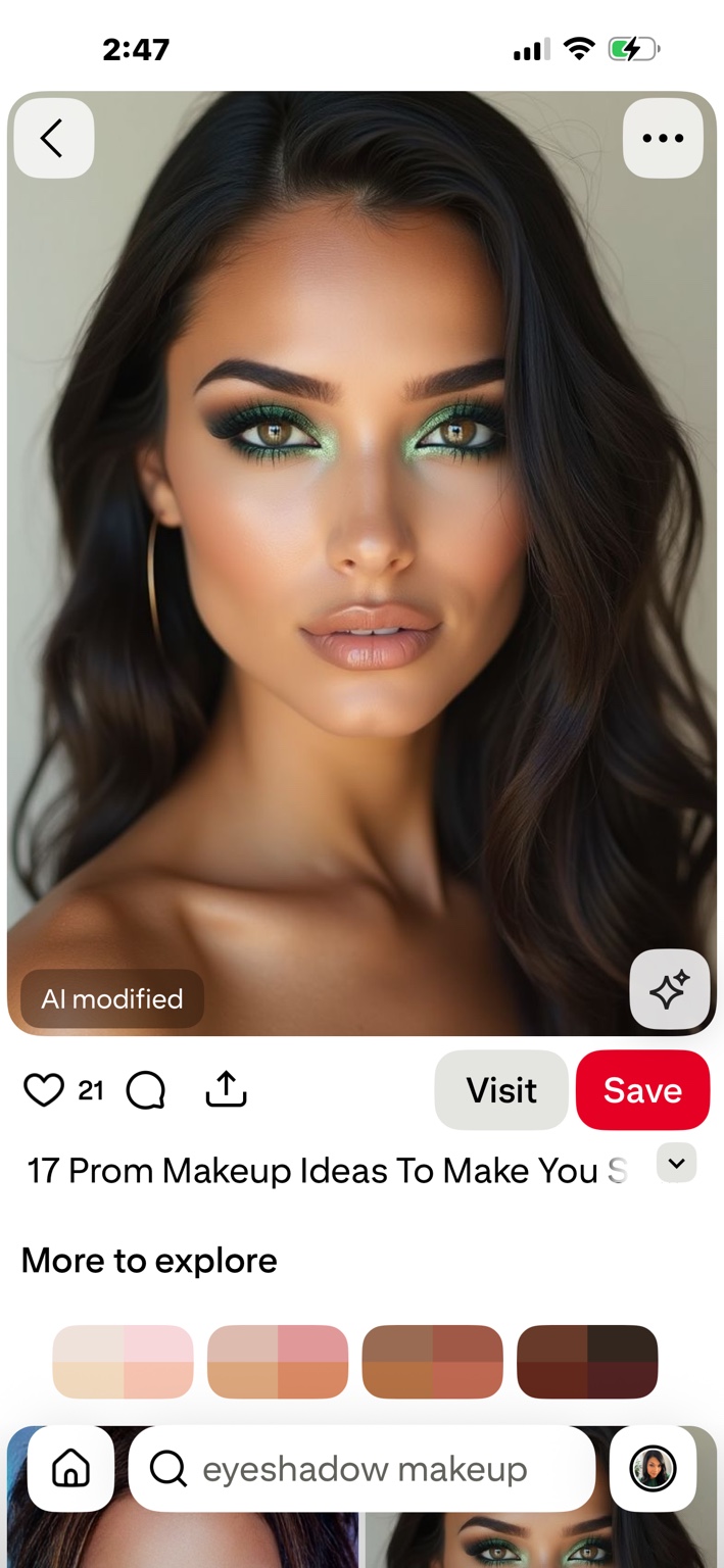 Brunette beauty portrait with emerald eye makeup and glossy nude lips.